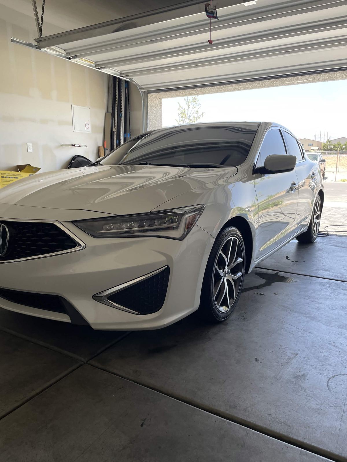White Acura sedan before exterior detail in Las Vegas